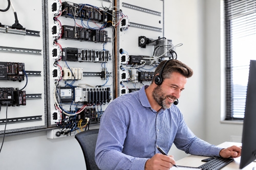 Sales and Technical Support Engineer at desk